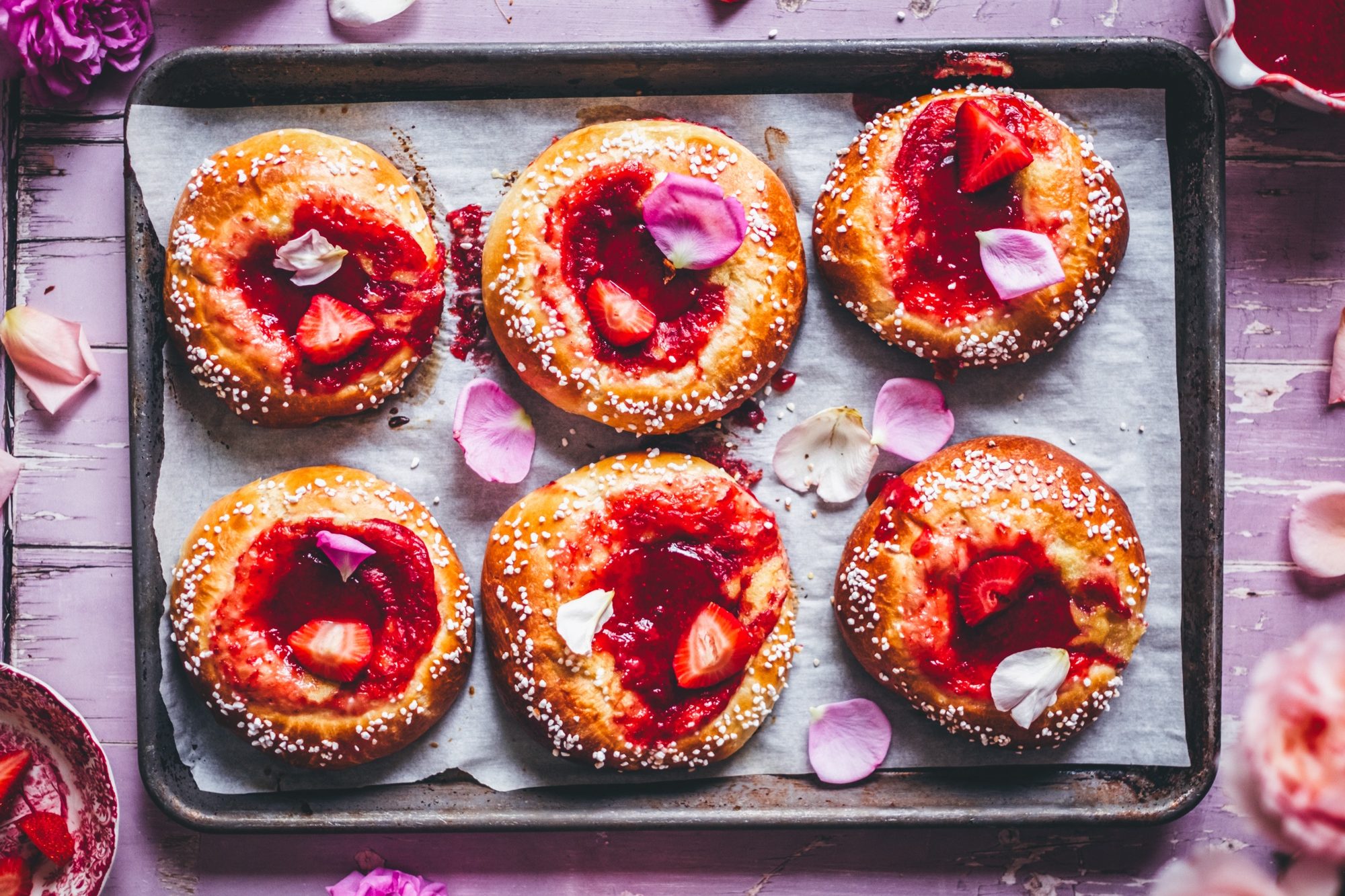 Brioche buns filled with strawberry rhubarb jam and frangipane.